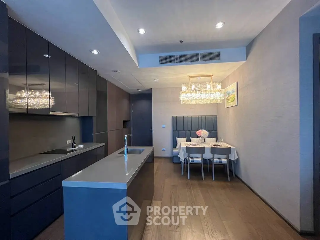 Luxurious modern kitchen with sleek cabinetry and elegant dining area