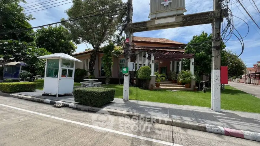 Charming suburban house with lush garden and inviting entrance
