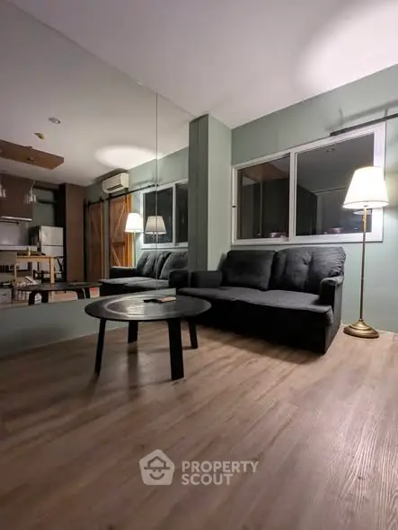 Modern living room with cozy sofa and stylish decor