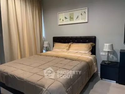 Cozy bedroom with elegant decor and soft lighting, perfect for relaxation.