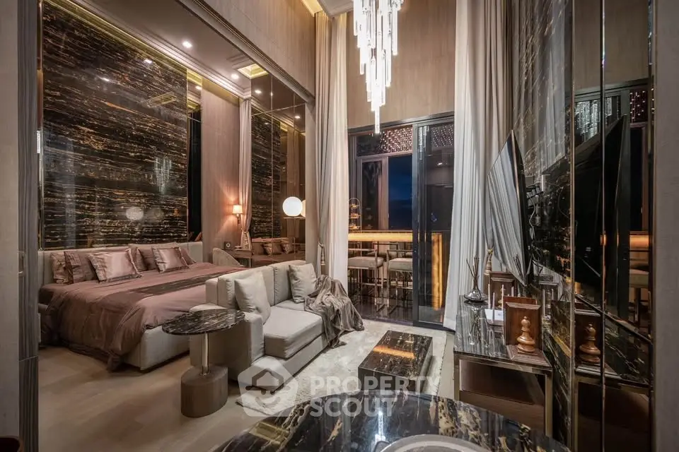 Luxurious modern living room with elegant decor and stunning night view.