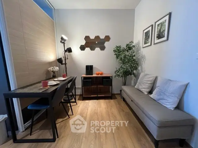 Stylish modern living room with elegant decor and cozy seating area.