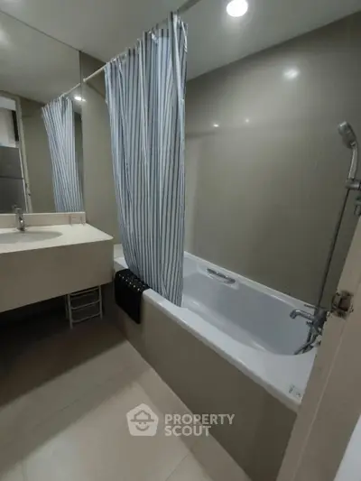 Modern bathroom with bathtub and sleek design