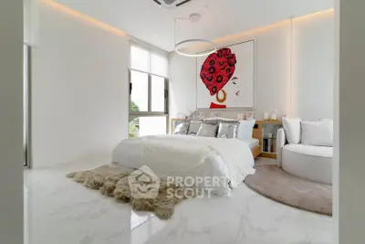 Luxurious modern bedroom with elegant decor and large window view