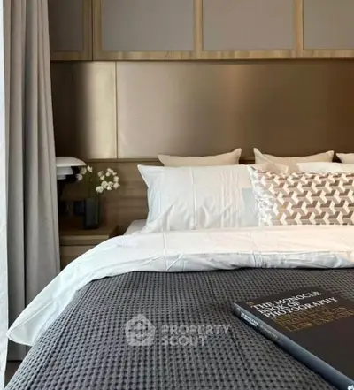 Luxurious bedroom with elegant decor and plush bedding, perfect for relaxation and comfort.