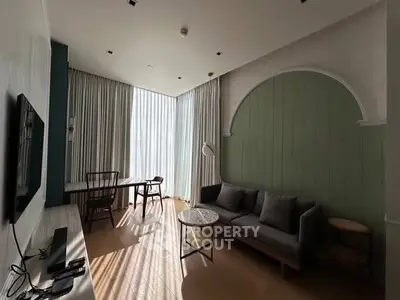 Modern living room with stylish decor and natural light