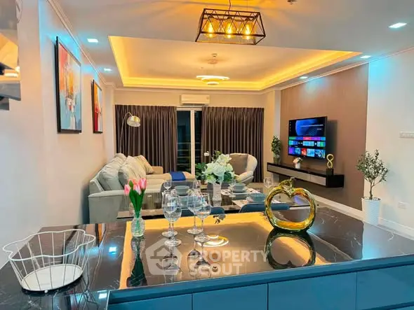 Luxurious modern living room with elegant decor and ambient lighting
