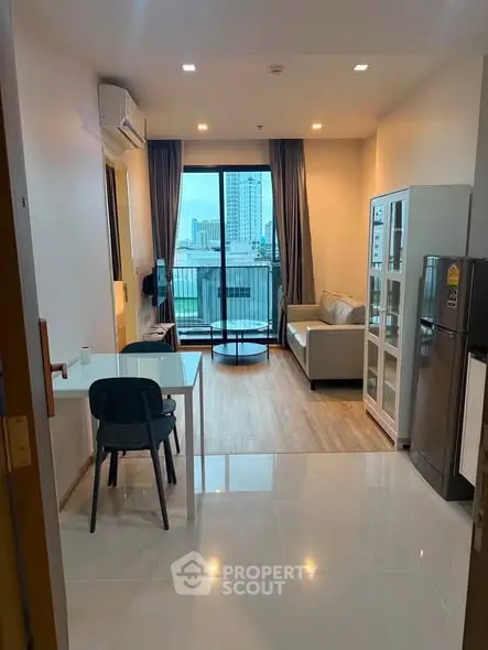 Modern living room with city view, featuring sleek furniture and open layout for urban living.