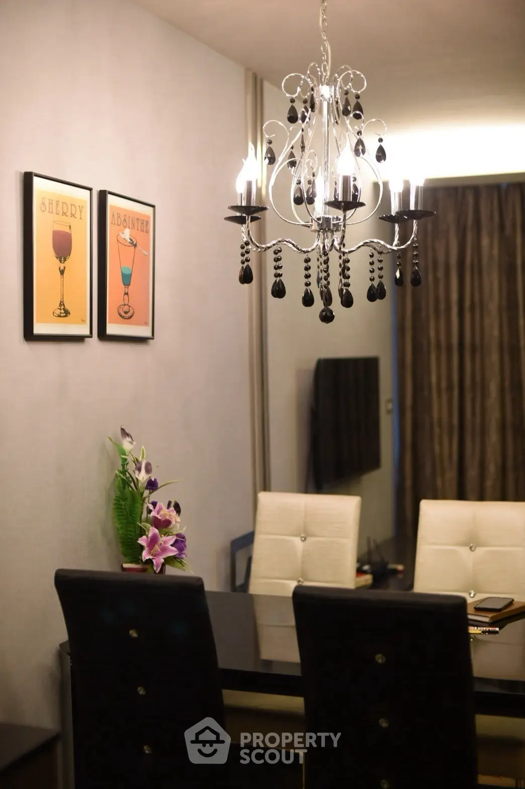 Elegant dining room with chandelier and modern decor