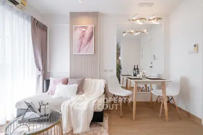 Stylish modern living room with cozy decor and elegant dining area