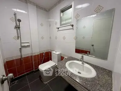 Modern bathroom with sleek fixtures and stylish tile design