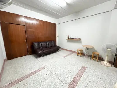Spacious living room with modern sofa and minimalist decor