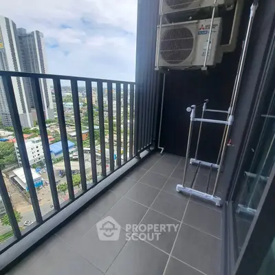 Modern high-rise balcony with city view and air conditioning unit