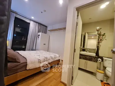 Cozy bedroom with ensuite bathroom and modern decor
