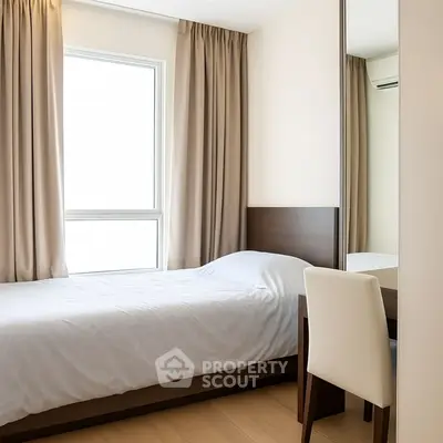 Cozy minimalist bedroom with natural light and modern furnishings