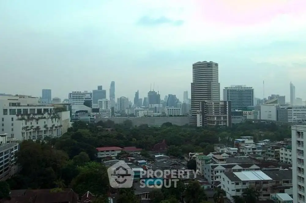 Stunning cityscape view showcasing urban skyline and lush greenery
