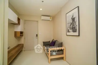 Cozy modern living room with minimalist decor and air conditioning