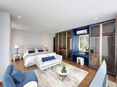 Luxurious modern bedroom with stylish decor and spacious layout
