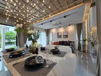 Luxurious modern living room with elegant dining setup and stylish decor, perfect for entertaining guests.