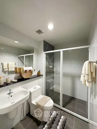 Modern bathroom with sleek shower enclosure and stylish decor