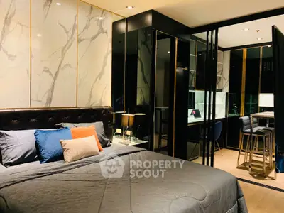 Luxurious modern bedroom with elegant marble accents and cozy lighting