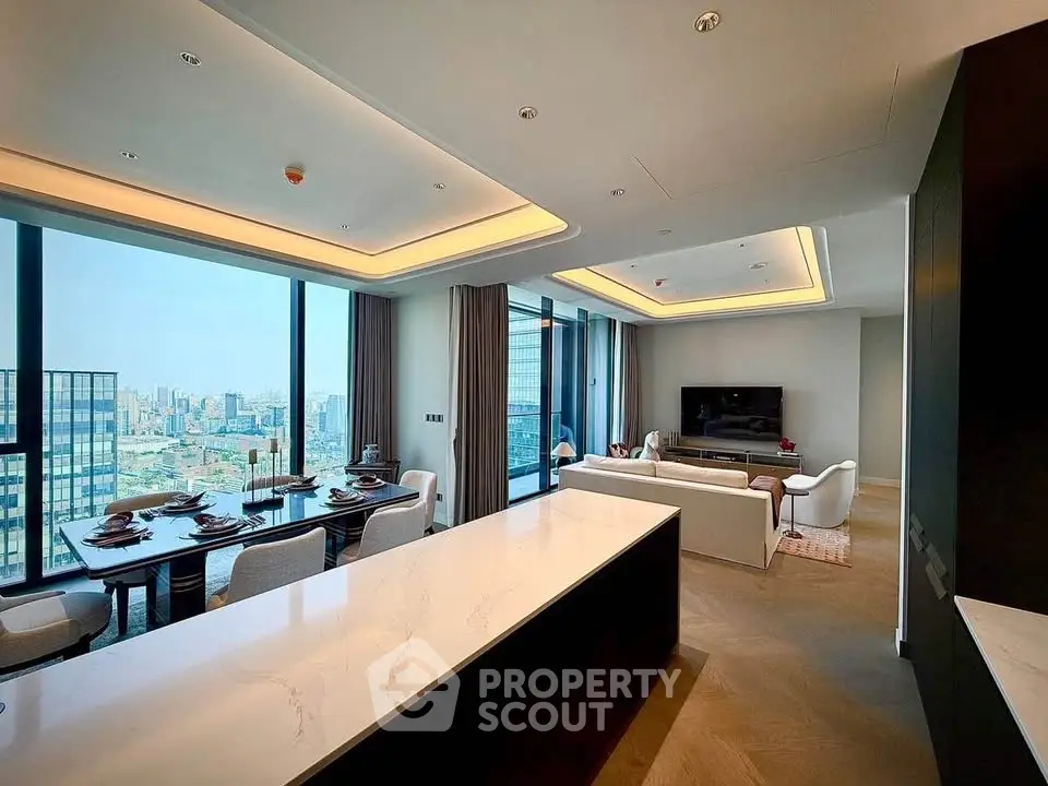 Luxurious open-plan living room with stunning city views and elegant dining area.