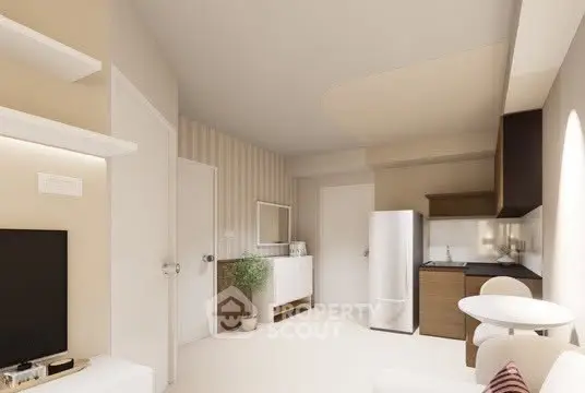 Modern open-layout kitchen and living area with sleek design and neutral tones.