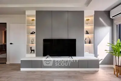 Modern living room with sleek TV unit and stylish decor