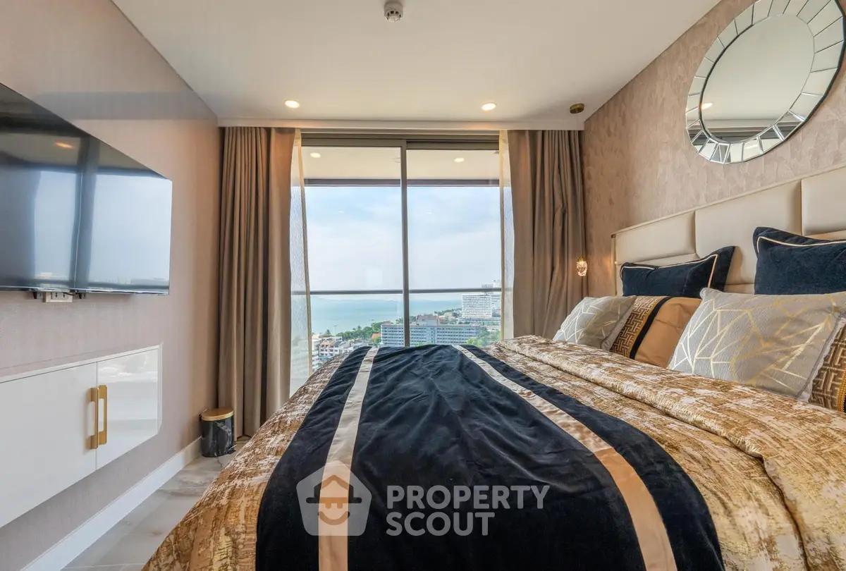 Luxurious bedroom with stunning ocean view and modern decor