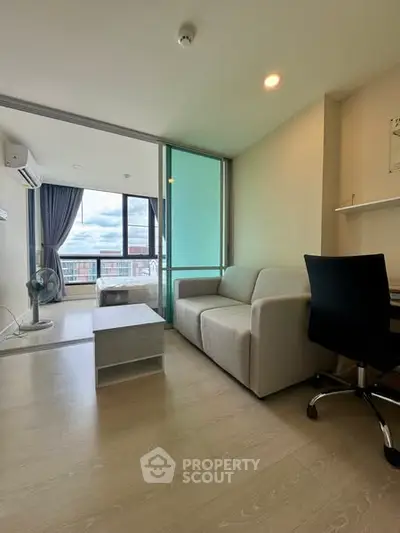 Modern living room with balcony view in a stylish apartment