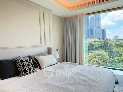 Luxurious bedroom with stunning city view and elegant decor
