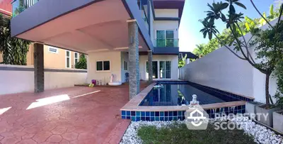 Modern home with spacious patio and private pool, perfect for relaxation and entertainment.