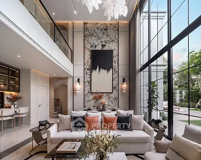 Luxurious modern living room with high ceilings and large windows, elegant decor and open layout.