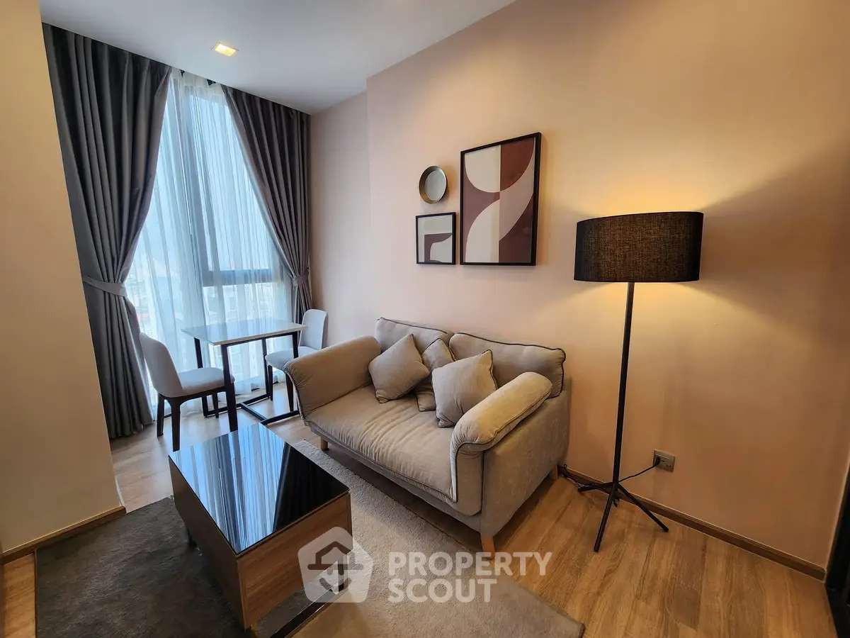 Stylish modern living room with cozy sofa and elegant decor in a bright apartment.