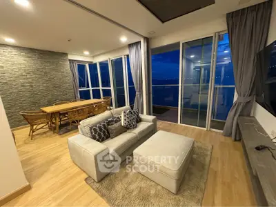 Luxurious living room with stunning night view and elegant decor