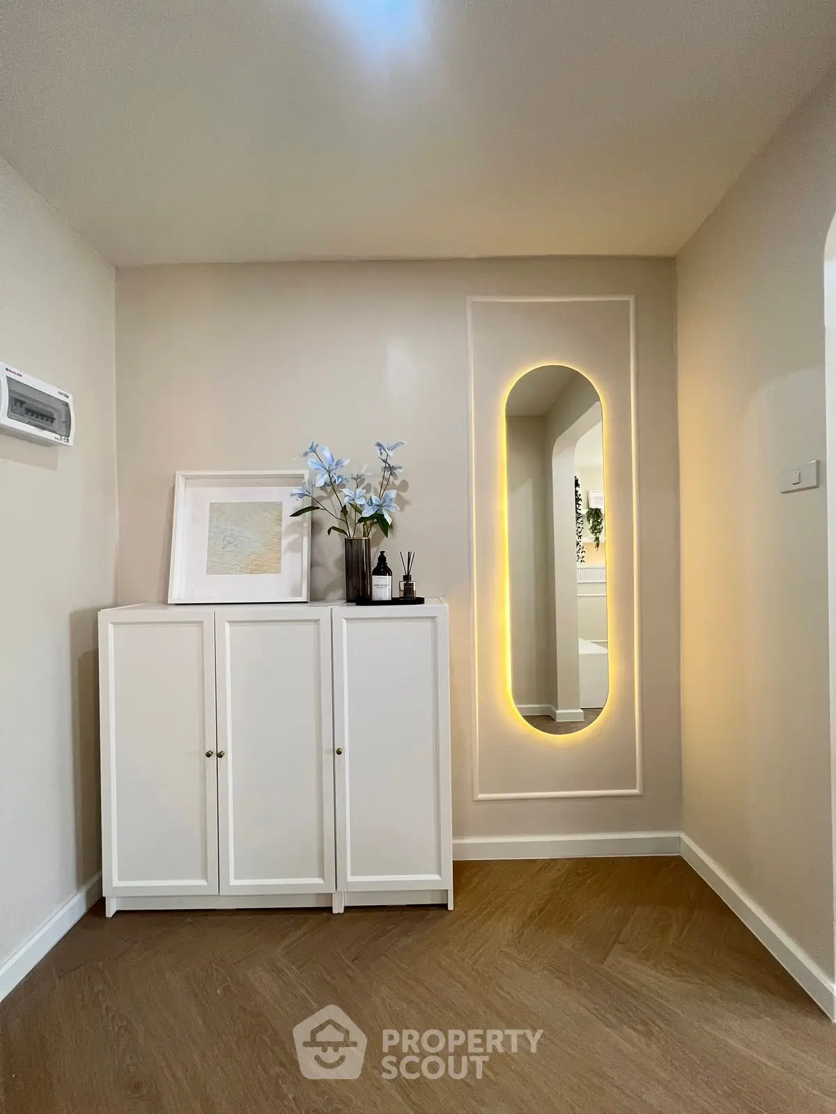 Stylish interior with modern decor and elegant lighting in a cozy living space.