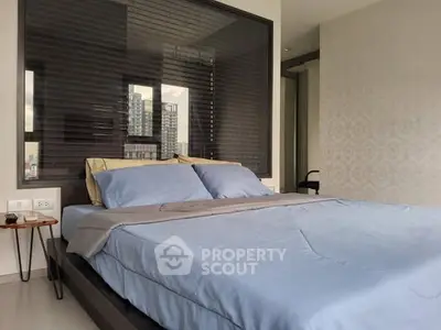 Modern bedroom with city view and stylish decor