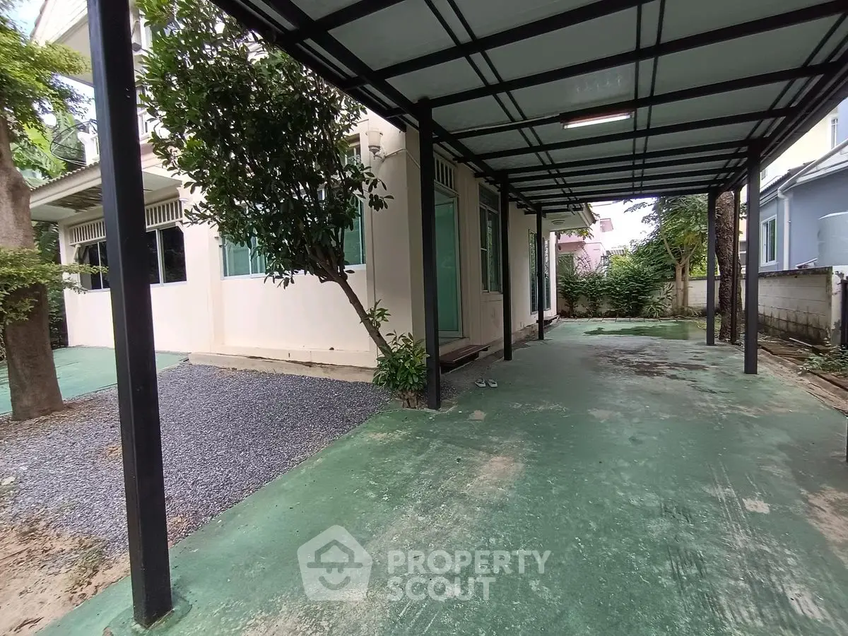 Spacious covered parking area in modern residential property