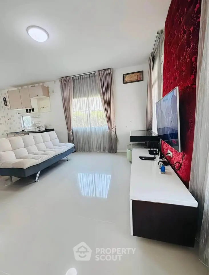 Spacious modern living room with sleek decor and natural light