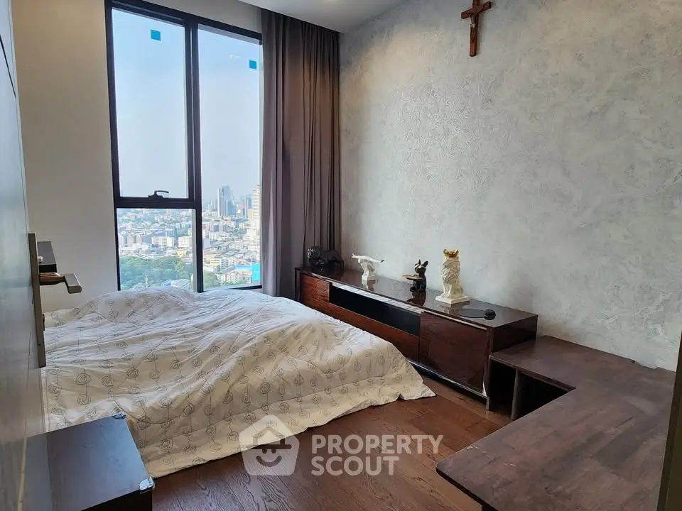 Modern bedroom with city view and stylish decor