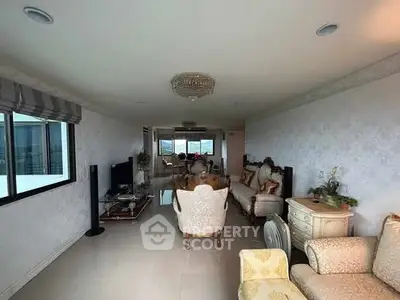 Luxurious living room with elegant furniture and panoramic city view