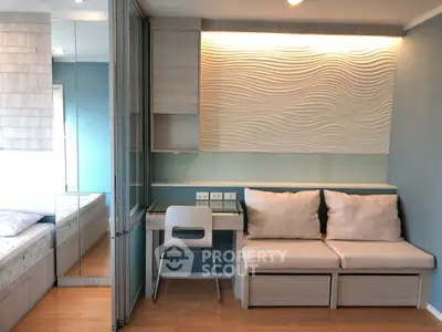 Modern studio apartment with stylish decor and functional furniture