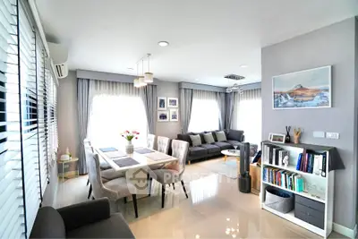 Spacious modern living room with elegant decor and ample natural light