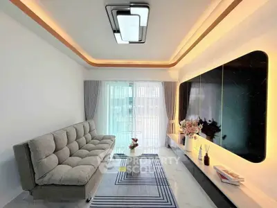 Modern living room with stylish lighting and sleek furniture