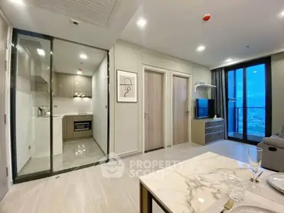 Modern open-plan living room with kitchen and city view, featuring sleek furniture and elegant decor.
