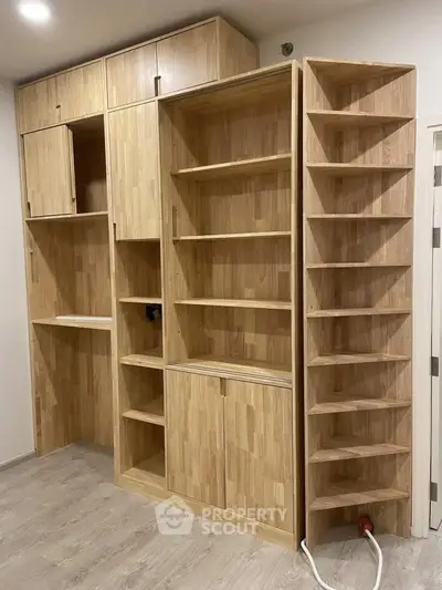 Custom wooden shelving unit with ample storage in modern interior