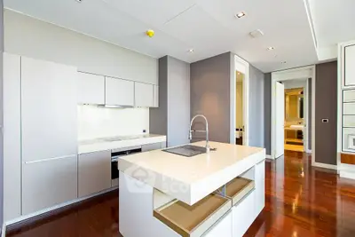 Modern kitchen with sleek design and island in luxury apartment