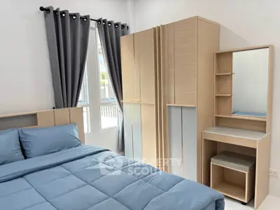 Modern bedroom with stylish furniture and natural light