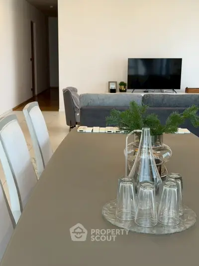 Modern living room with elegant dining table and stylish decor