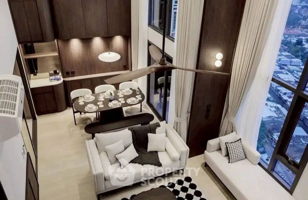 Luxurious modern living room with high ceiling and elegant decor